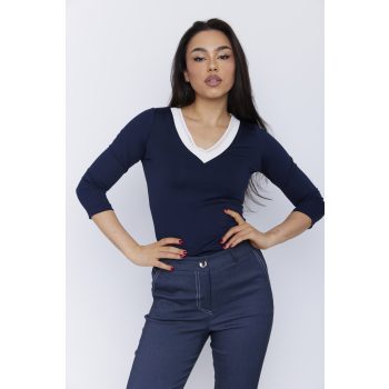 Trudy women's V-neck top with  trim and fitted hem