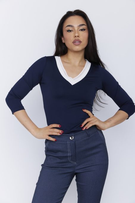 Trudy women's V-neck top with  trim and fitted hem